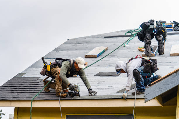 Professional Gutter Installation technician working in Westport, WA